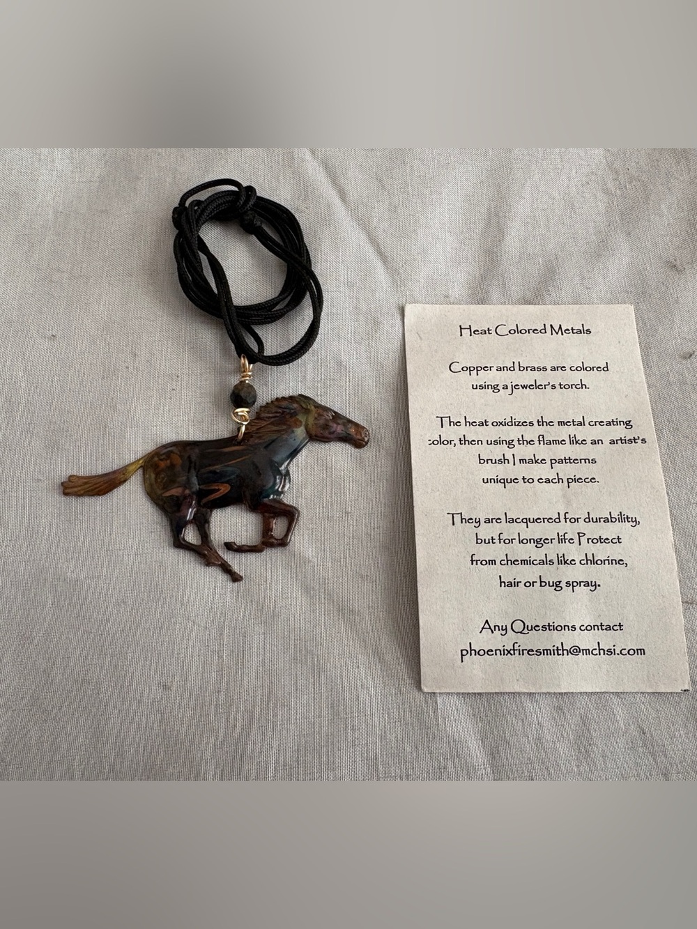 Firesmithed Heat-Colored Horse Pendant Necklace - copper & brass & leather cord
